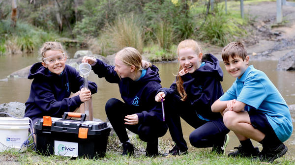 Students engaged in outdoor learning activities at Harkaway Primary School